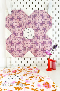 quilt block from the flower friends pattern. This modern floral design is great for busting some FQs